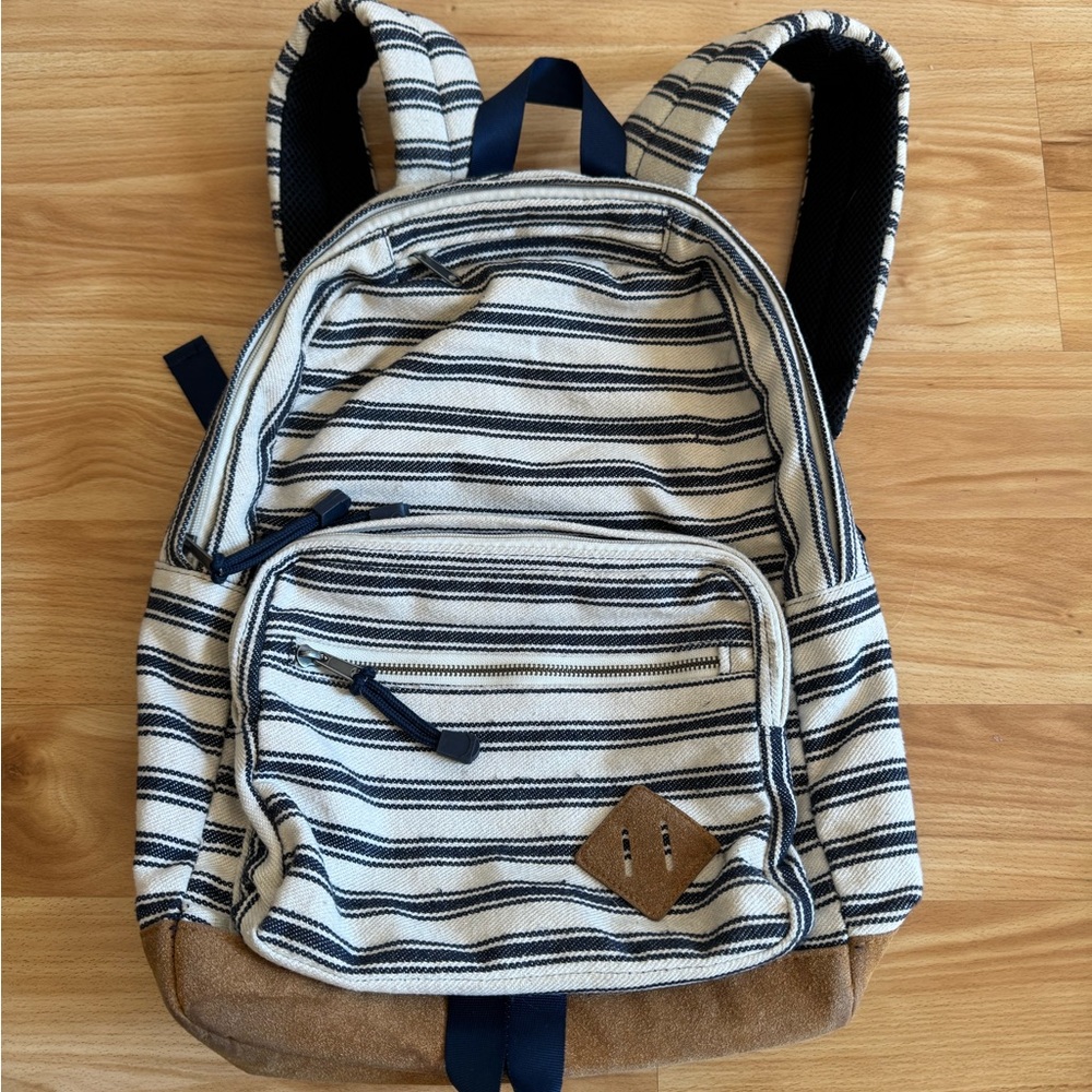 Blue and White Striped Backpack with Faux Suede Bottom